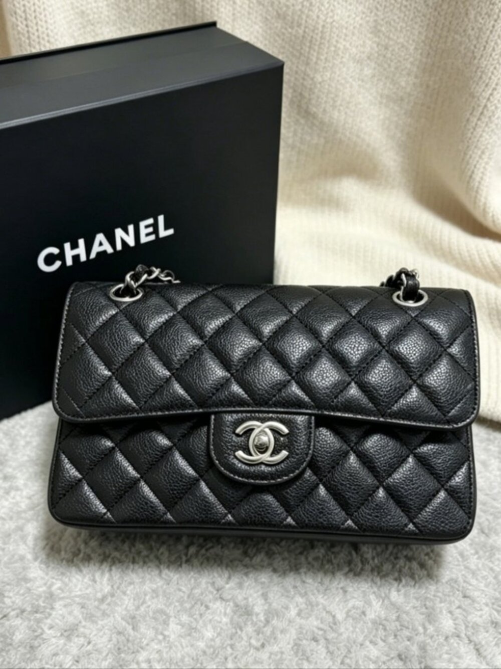 CHANEL Classic Flap Bag in Black Caviar Leather